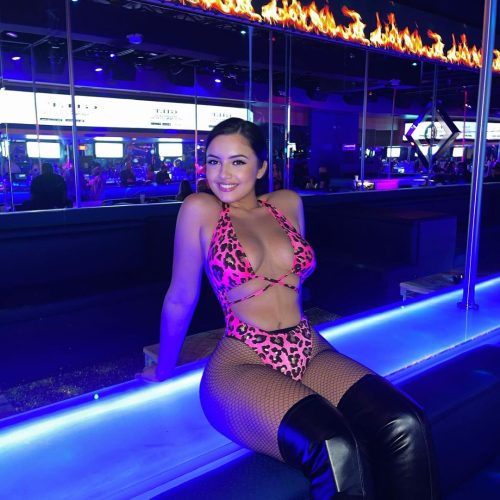 Best Miami Strip Club entertainer sitting at bar